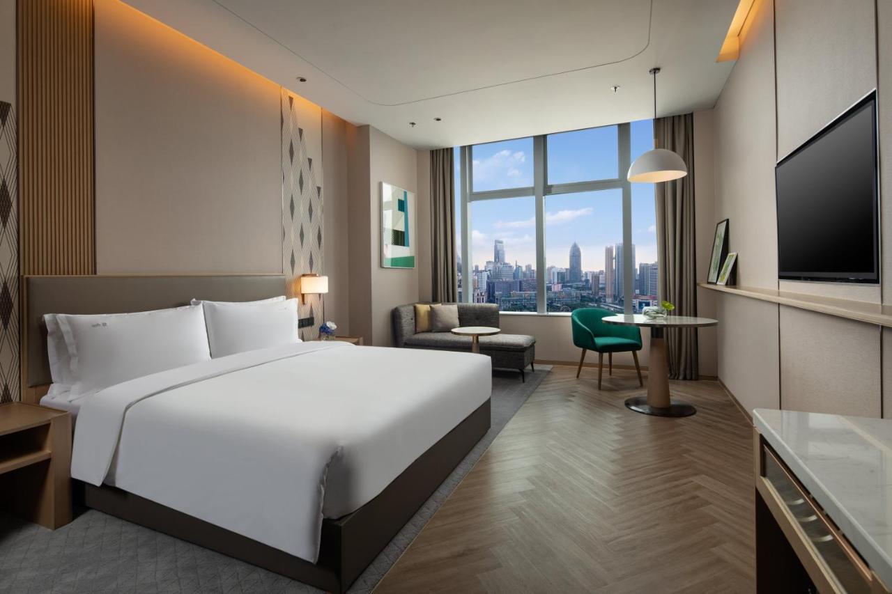 Holiday Inn Wuxi Central Station By Ihg Exterior foto